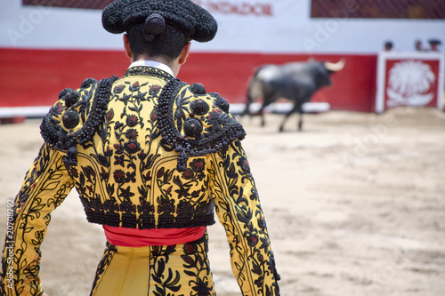 Photo: Matador in Ring with Bull Matador in Ring with Bull