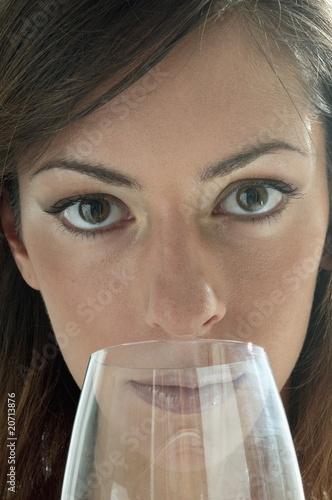 Photo: Young woman with a wine glass Young woman with a wine glass