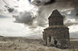 ruined church in a dry dark landscape