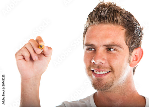 Foto: Man holding a pen Man holding a pen