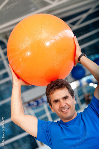 Photo: Man with pilates ball Man with pilates ball