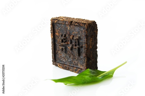 Foto: pressed tea, hieroglyph "Pu-erh tea" pressed tea, hieroglyph "Pu-erh tea"