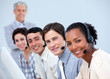 Photo: Positive business people working in a call center Positive business people working in a call center