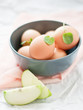 Eggs and apple slices on the table