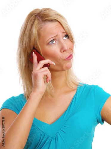 Foto: Frau genervt am Telefon Frau genervt am Telefon
