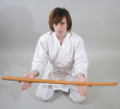 young man in a kimono with a bokken