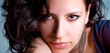 Foto: a pretty young woman with ear-ring a pretty young woman with ear-ring