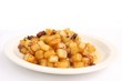 Fried potatoes with caramelized pork