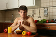 Young Muscular Man Eating His Breakfast