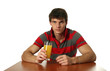 Young Sexy Man Drinking Orange Juice