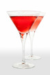 Two martini wineglasses with red cocktail