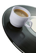 Coffeecup on vinyl record