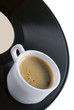 Coffeecup on vinyl record