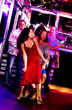 Young adults at a nightclub dancing