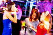 Young adults at a nightclub dancing