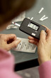 Woman checking blood sugar Woman checking blood sugar