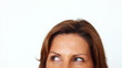 Young female looking at copy space on white