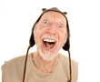 Laughing senior man in knit cap