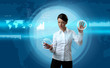 Photo: Attractive brunette navigating futuristic interface Attractive brunette navigating futuristic interface