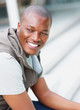 Portrait of a smiling young man looking away