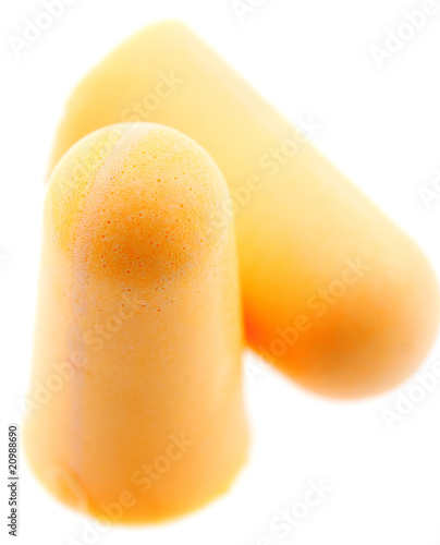 Photo: bouchons d'oreilles en mousse anti-bruit , fond blanc bouchons d'oreilles en mousse anti-bruit , fond blanc