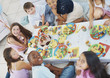 Group of friends sitting together around a snacks table