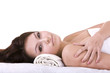 Beautiful young woman in spa. Isolated.