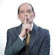 homme d'affaires silence index sur la bouche