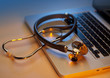 Photo: Laptop and stethoscope Laptop and stethoscope