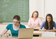 Students studying in classroom