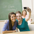 Students taking self-portrait in classroom
