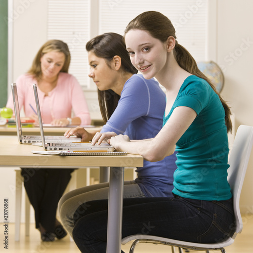 Photo: Students using laptops in classroom Students using laptops in classroom