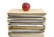 File Stack and red apple close up shot on white background File Stack and red apple close up shot on white background