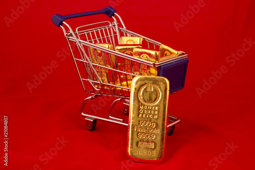 Photo: Goldbarren im Einkaufswagen Goldbarren im Einkaufswagen