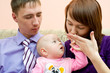young family, husband is jealous of wife