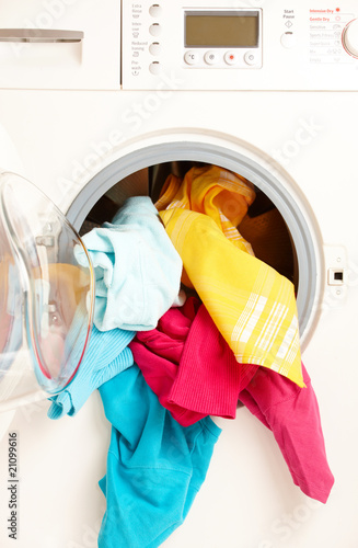 Photo: washing machine with colorful clothes washing machine with colorful clothes