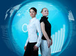 Photo: Attractive couple of businesswomen in futuristic interface Attractive couple of businesswomen in futuristic interface