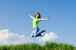 Foto: pretty young woman is jumping pretty young woman is jumping