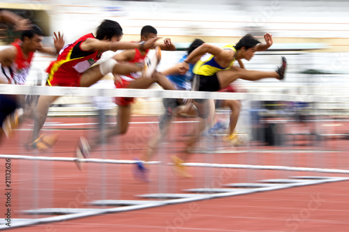 Photo: Men's 110 Meters Hurdles Action (Blurred) Men's 110 Meters Hurdles Action (Blurred)