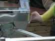 People passing through electronic turnstiles