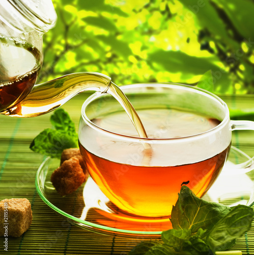 Photo: Pouring Healthy Tea Pouring Healthy Tea