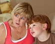 A grandmother and grandson share a moment together A grandmother and grandson share a moment together
