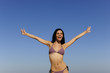 happy young woman on the beach