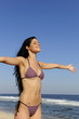 woman enjoying the sun on the beach