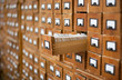 Photo: Old wooden card catalogue with one opened drawer Old wooden card catalogue with one opened drawer