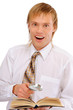 Young man with magnifier is surprised by read book