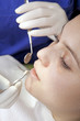 Photo: Young woman in dentists office Young woman in dentists office