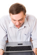 young man blamed for a laptop on a white background young man blamed for a laptop on a white background