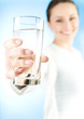 Healthy Young Woman with glass of fresh Water