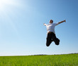 jumping happy young man